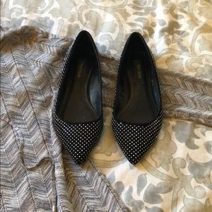Black studded flats
